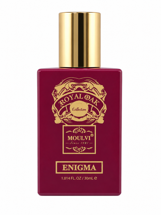 Moulié Enigma cologne bottle from Royal Oak Collection, featuring a deep burgundy glass bottle with a shiny gold cap and gold lettering.